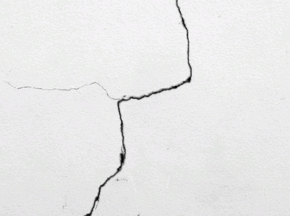 Cracks on render wall